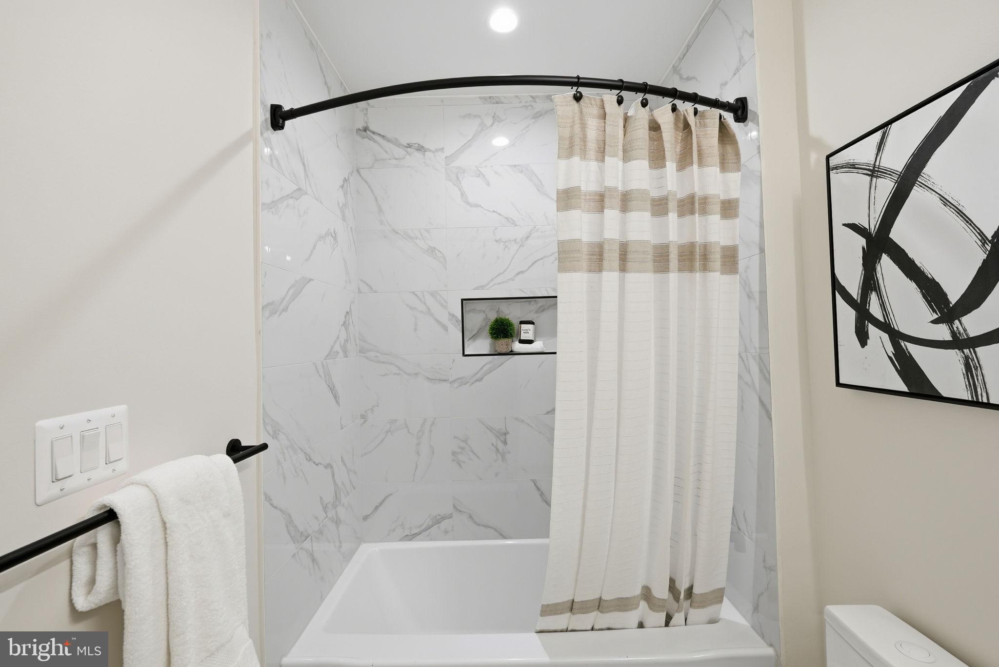 2134 Wisconsin Avenue Northwest, Unit 4 Washington, DC 20007 - Photo 22 of 35 a bathroom with a shower