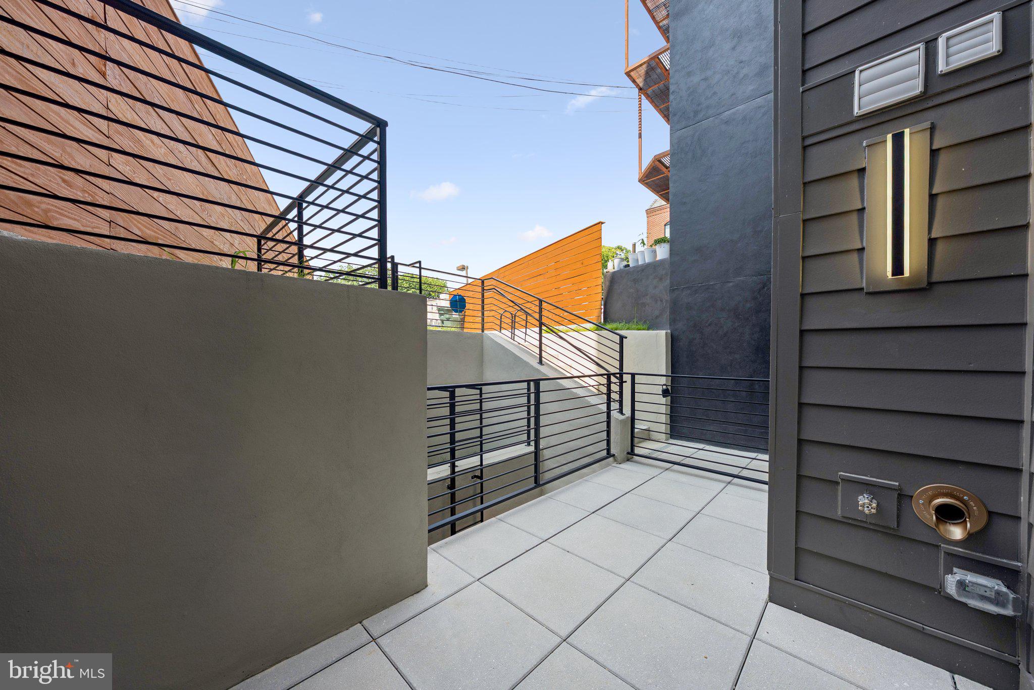 2134 Wisconsin Avenue Northwest, Unit 4 Washington, DC 20007 - Photo 24 of 35 a view of a house with a street
