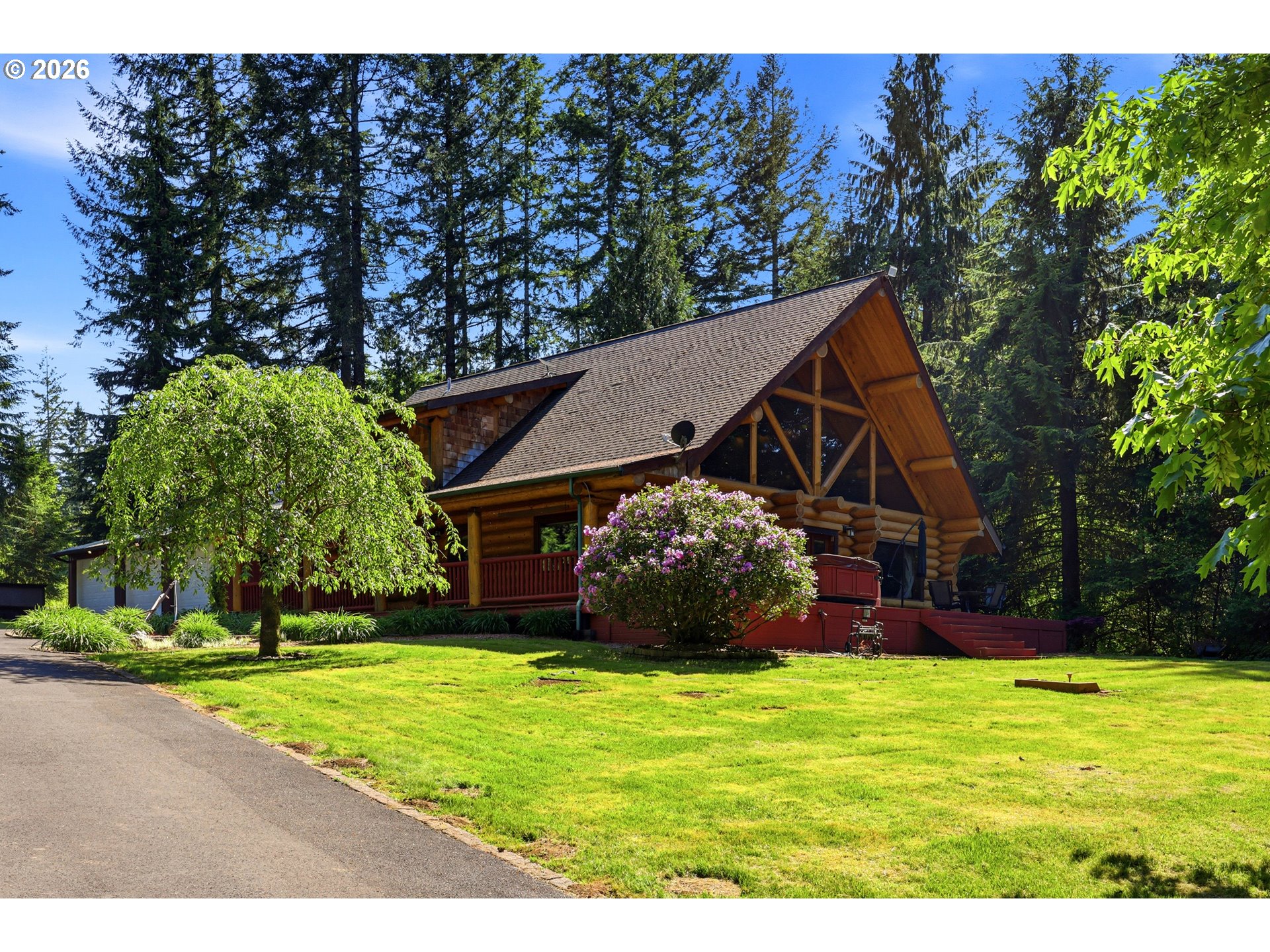 390 Spruce Creek Road Longview, WA 98632 - Photo 6 of 45 a view of a house with garden