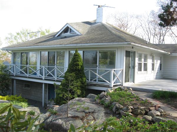 25 Starknaught Heights Gloucester, MA 01930 - Photo 1 of 10 a front view of a house with garden