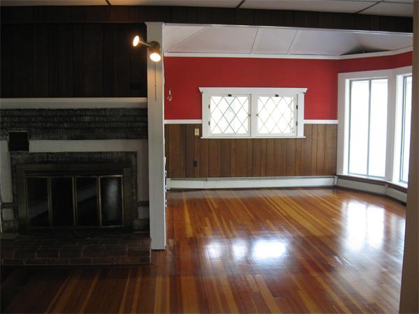 25 Starknaught Heights Gloucester, MA 01930 - Photo 5 of 10 a view of empty room with wooden floor and fan