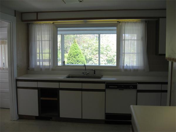 25 Starknaught Heights Gloucester, MA 01930 - Photo 8 of 10 a kitchen that has a sink and a window