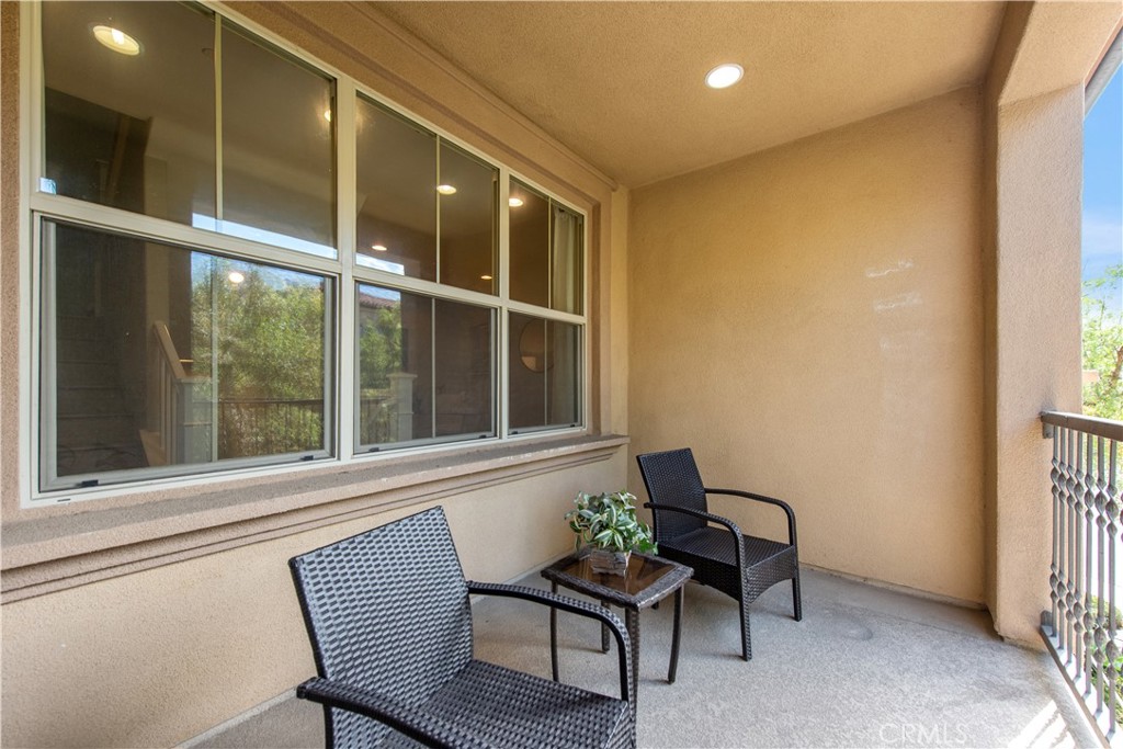 68 Origin Irvine, CA 92618 - Photo 27 of 43 a view of a house with a window and chair
