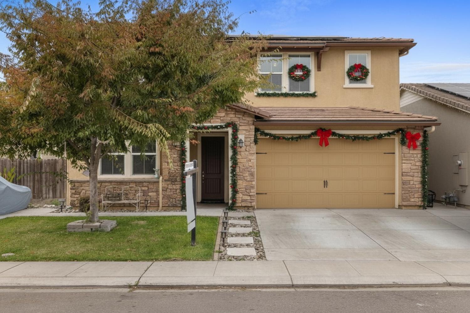 1513 Rock Spring Avenue Manteca, CA 95337 - Photo 1 of 56 a view of a house with a yard