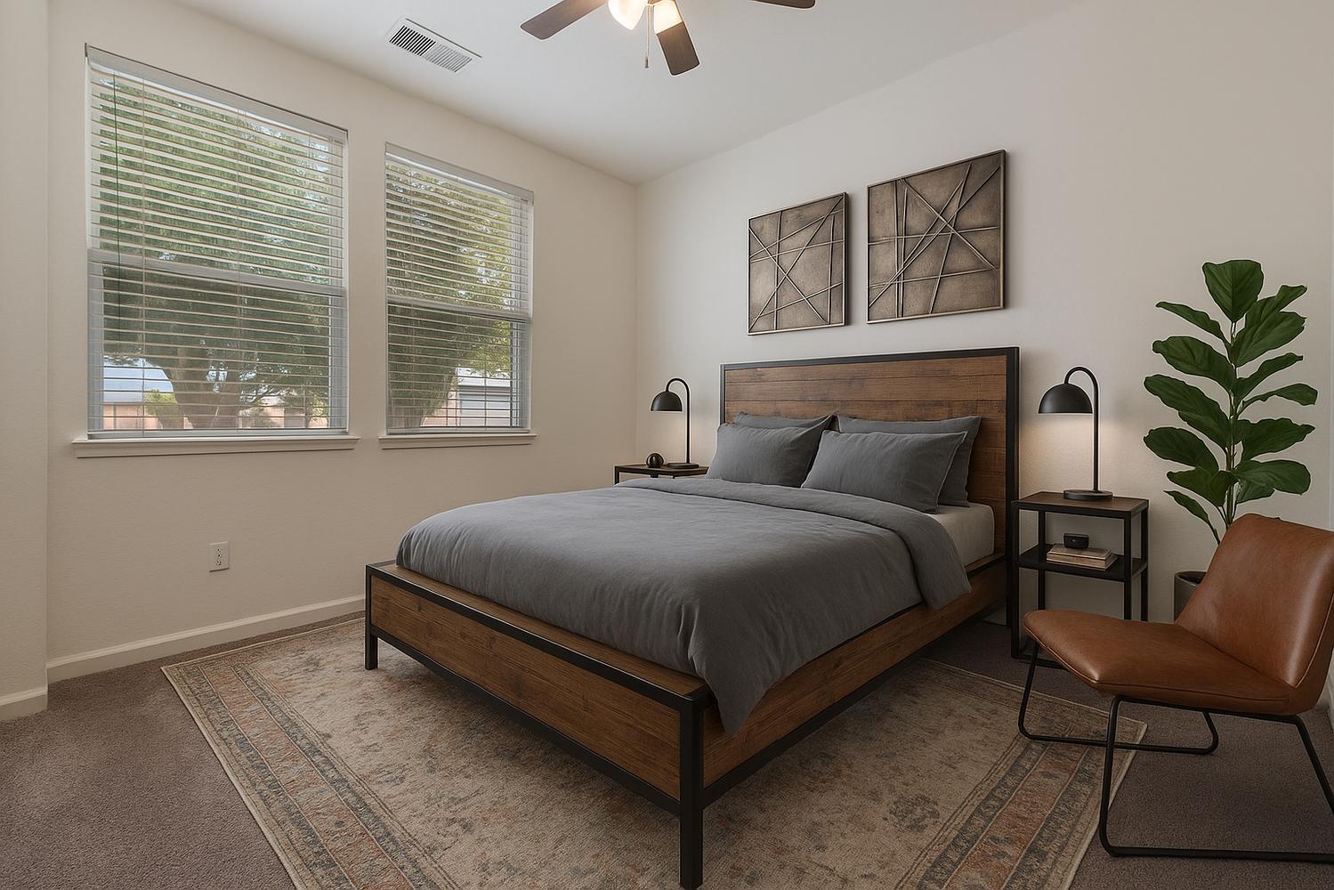 1513 Rock Spring Avenue Manteca, CA 95337 - Photo 11 of 56 a bedroom with a bed lamp and a potted plant