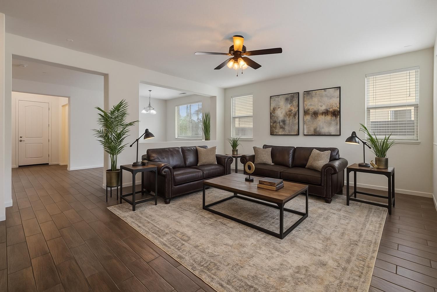 1513 Rock Spring Avenue Manteca, CA 95337 - Photo 16 of 56 a living room with furniture and wooden floor