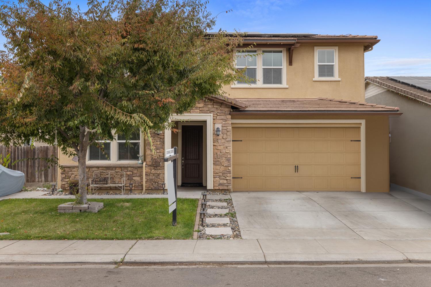 1513 Rock Spring Avenue Manteca, CA 95337 - Photo 3 of 56 a view of a house with a yard and large tree