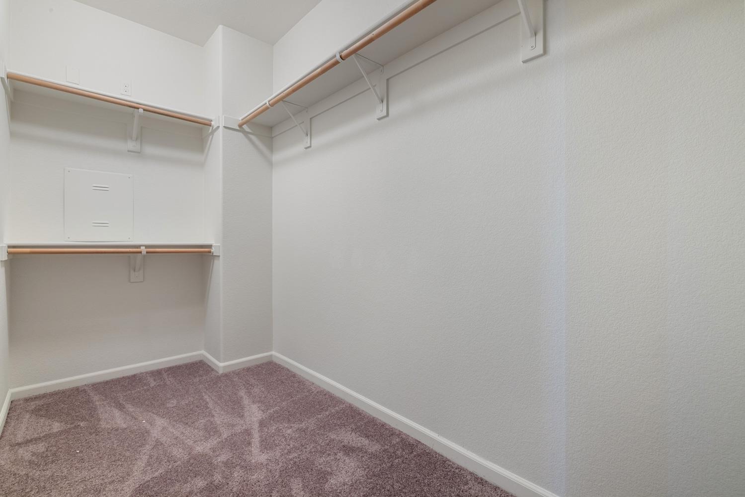 1513 Rock Spring Avenue Manteca, CA 95337 - Photo 32 of 56 a view of an empty walk in closet