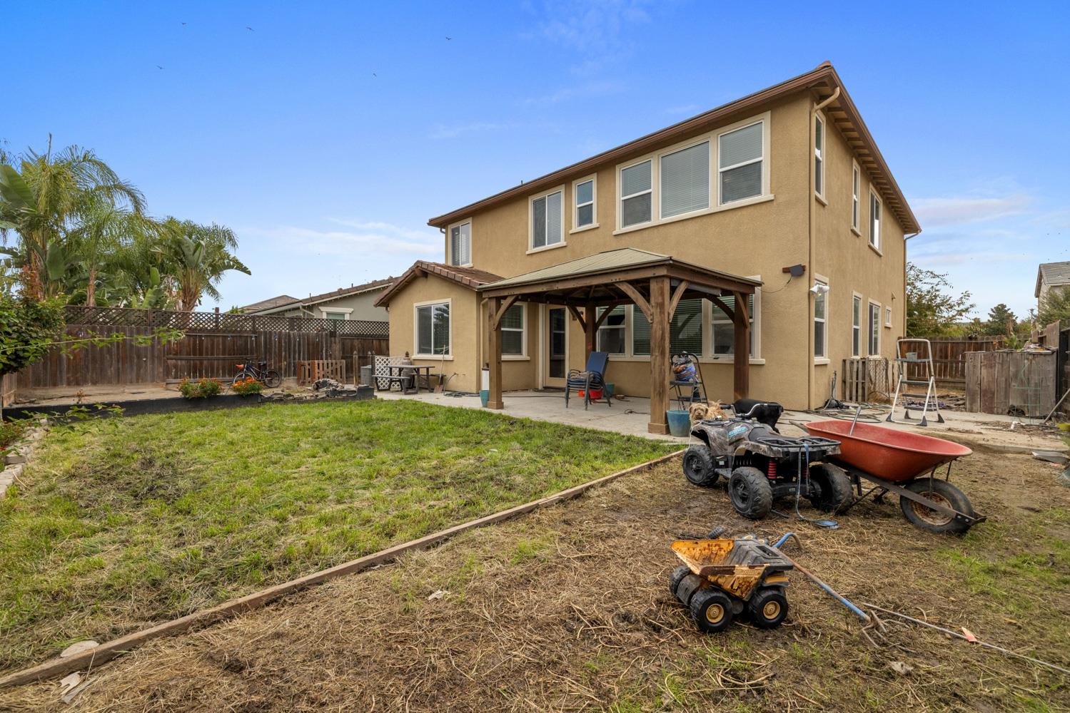 1513 Rock Spring Avenue Manteca, CA 95337 - Photo 43 of 56 a view of a house with backyard and sitting area