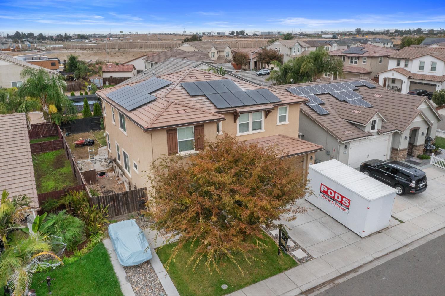 1513 Rock Spring Avenue Manteca, CA 95337 - Photo 44 of 56 an aerial view of a house with a yard