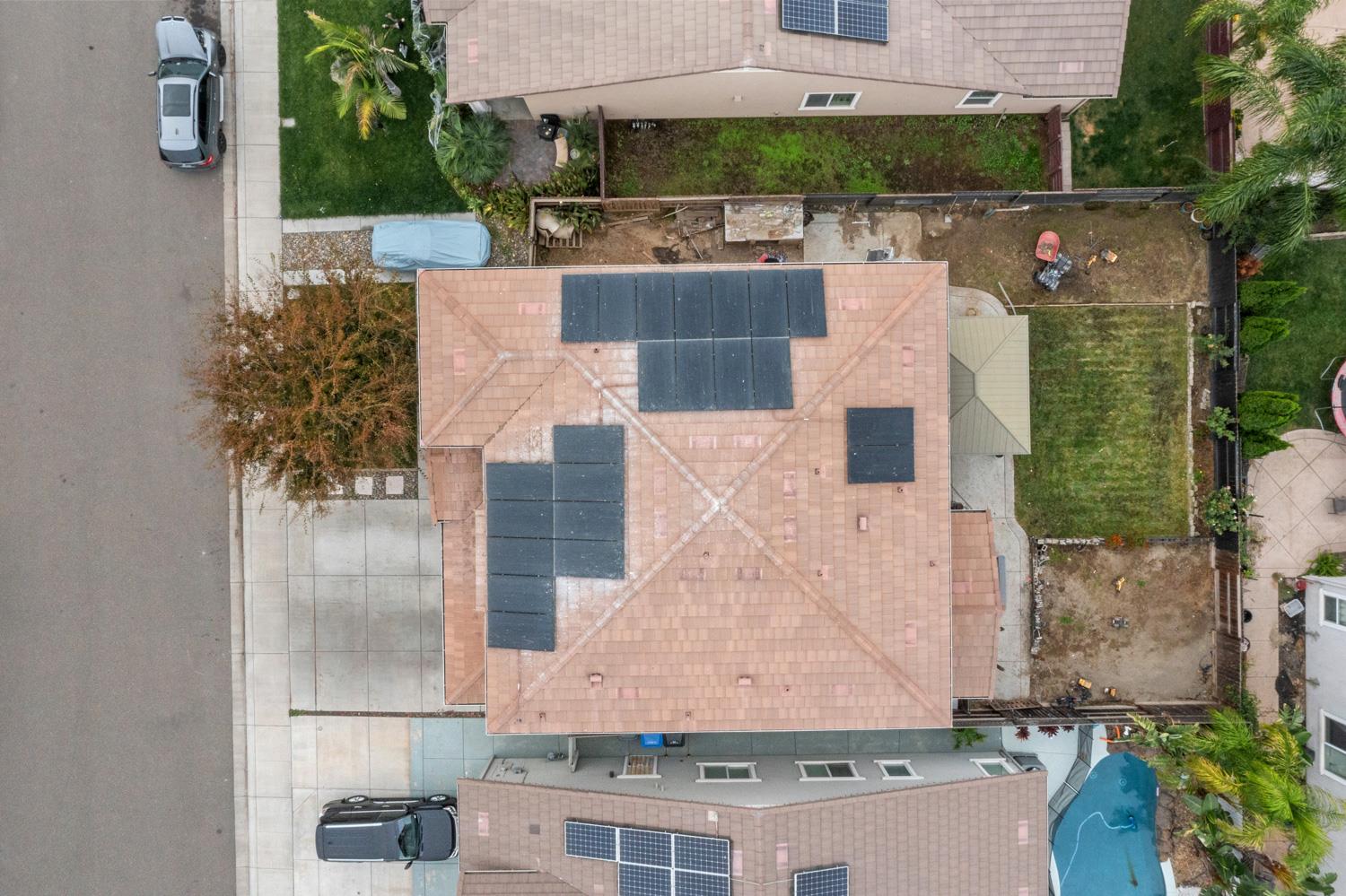 1513 Rock Spring Avenue Manteca, CA 95337 - Photo 46 of 56 an aerial view of multiple houses with outdoor space