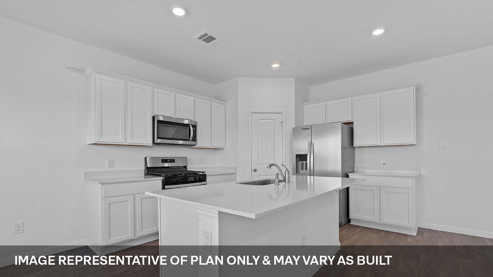 424 Mountain Pea Road Kyle, TX 78640 - Photo 8 of 25 a kitchen with cabinets a sink and white appliances
