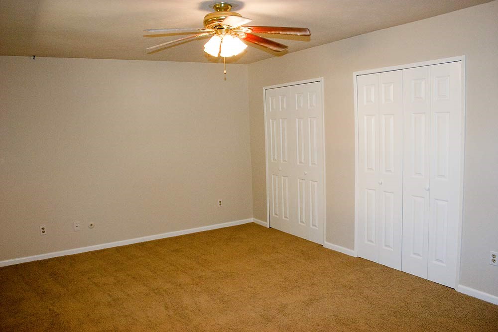 24122 Rafter 3 Drive Hockley, TX 77447 - Photo 17 of 18 an empty room with a chandelier fan