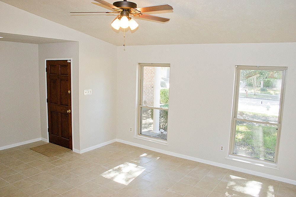 24122 Rafter 3 Drive Hockley, TX 77447 - Photo 10 of 18 a view of an empty room with a window