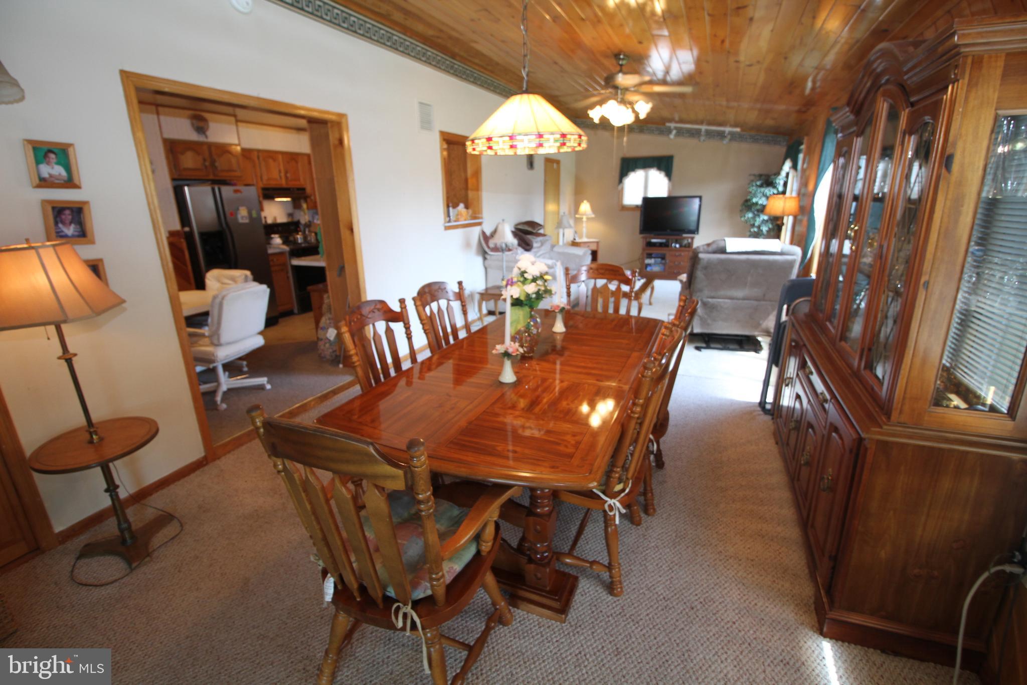 6 Claude Road Hamilton, NJ 08620 - Photo 11 of 29 a view of a dining room with furniture and chandelier