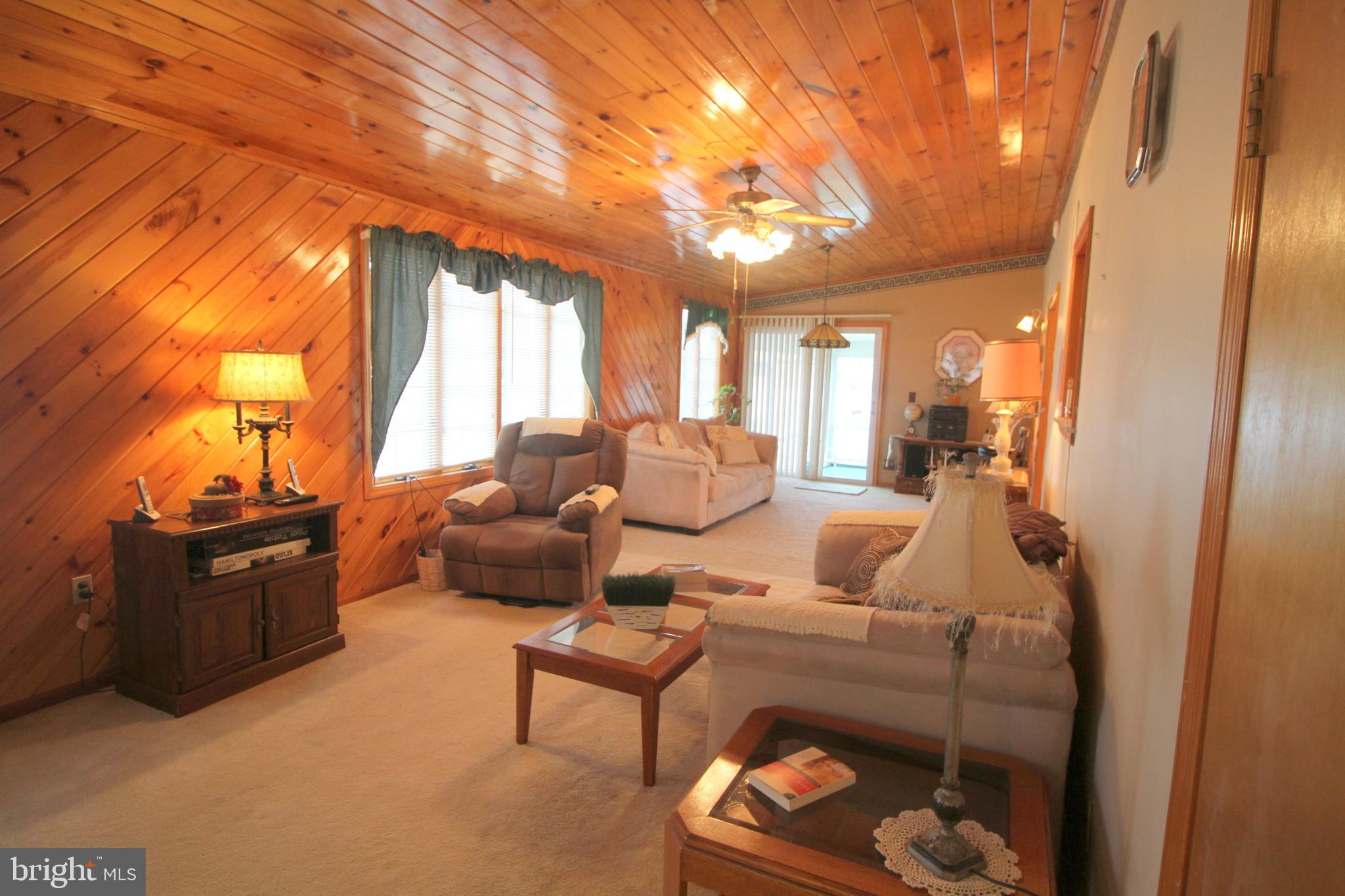 6 Claude Road Hamilton, NJ 08620 - Photo 13 of 29 a living room with furniture and a fireplace
