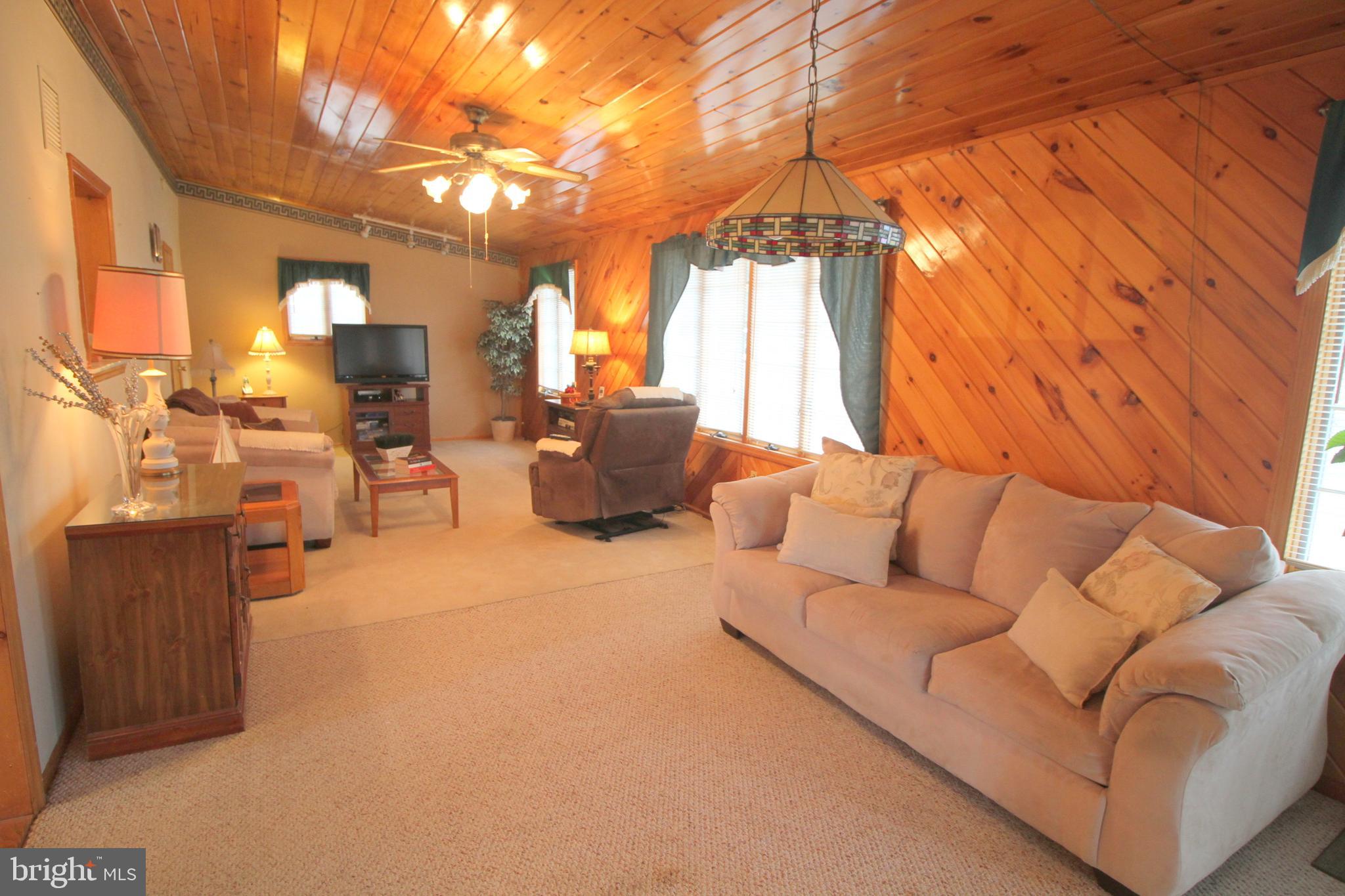 6 Claude Road Hamilton, NJ 08620 - Photo 14 of 29 a outdoor living space with furniture and a fireplace