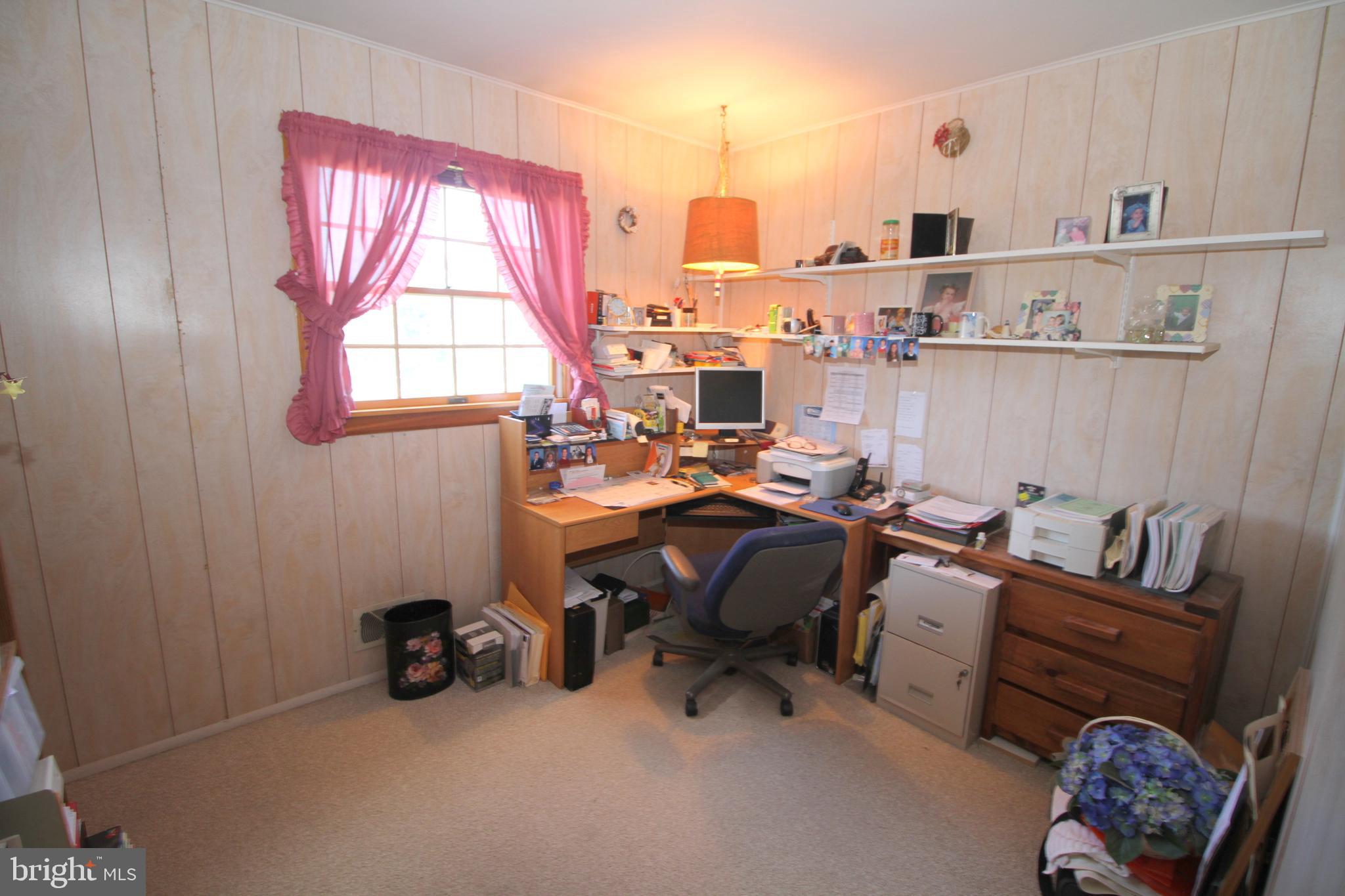 6 Claude Road Hamilton, NJ 08620 - Photo 20 of 29 a view of a workspace with furniture and a window