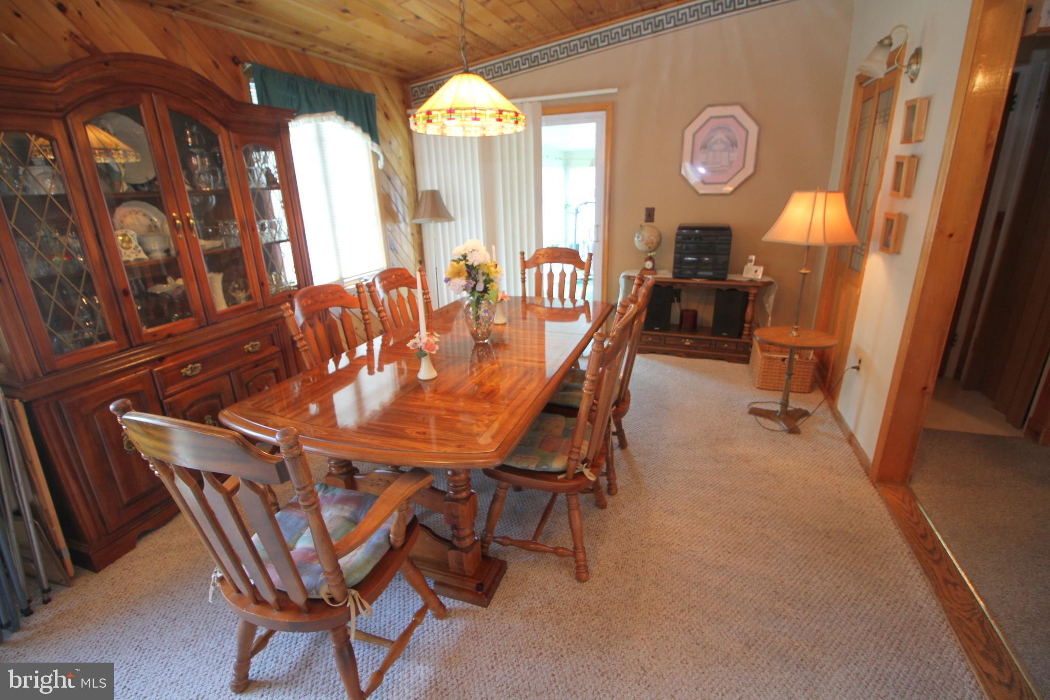 6 Claude Road Hamilton, NJ 08620 - Photo 10 of 29 a view of a dining room with furniture and a large window