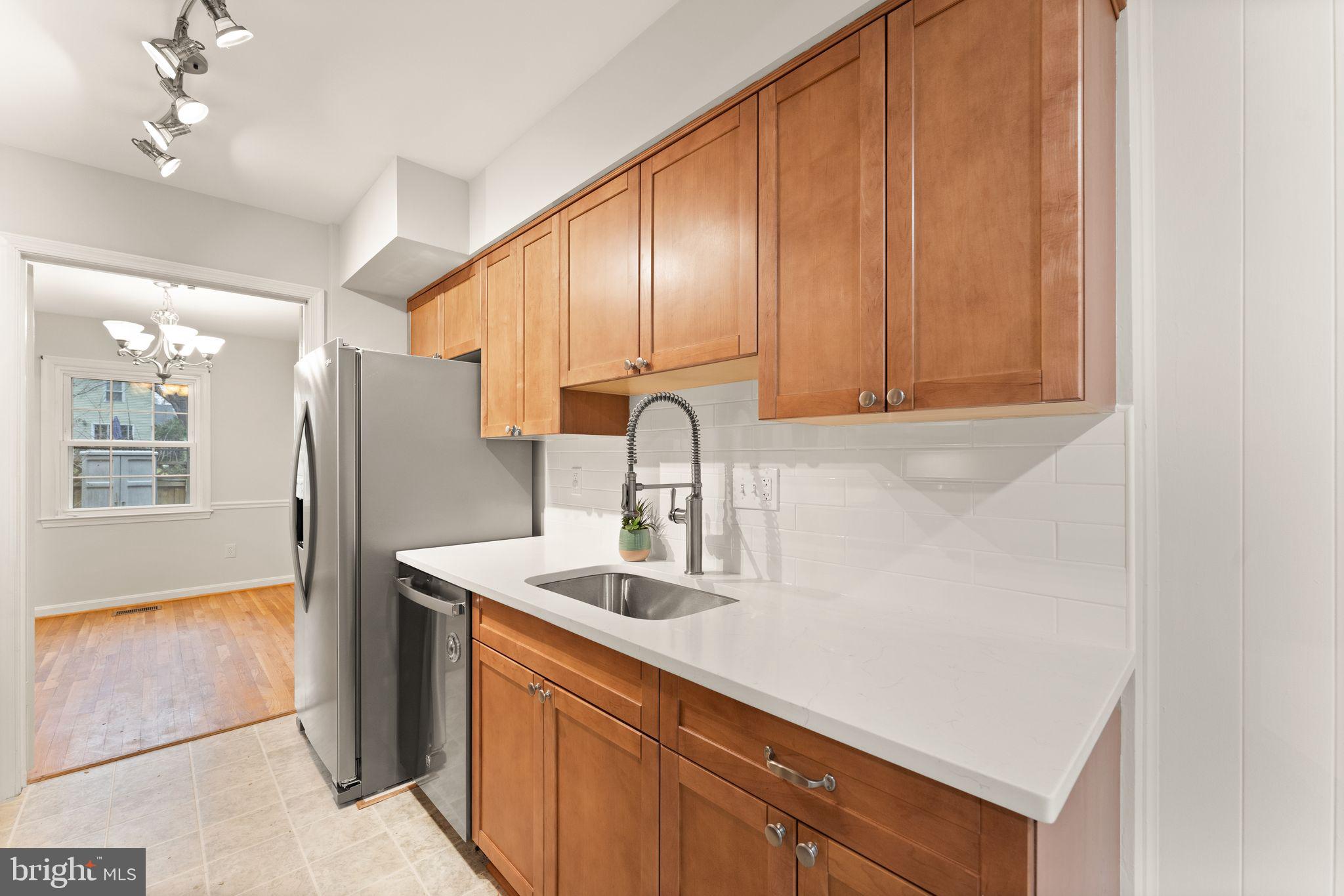 9710 Cardinal Road Fairfax, VA 22030 - Photo 17 of 51 New granite countertops and backsplash
