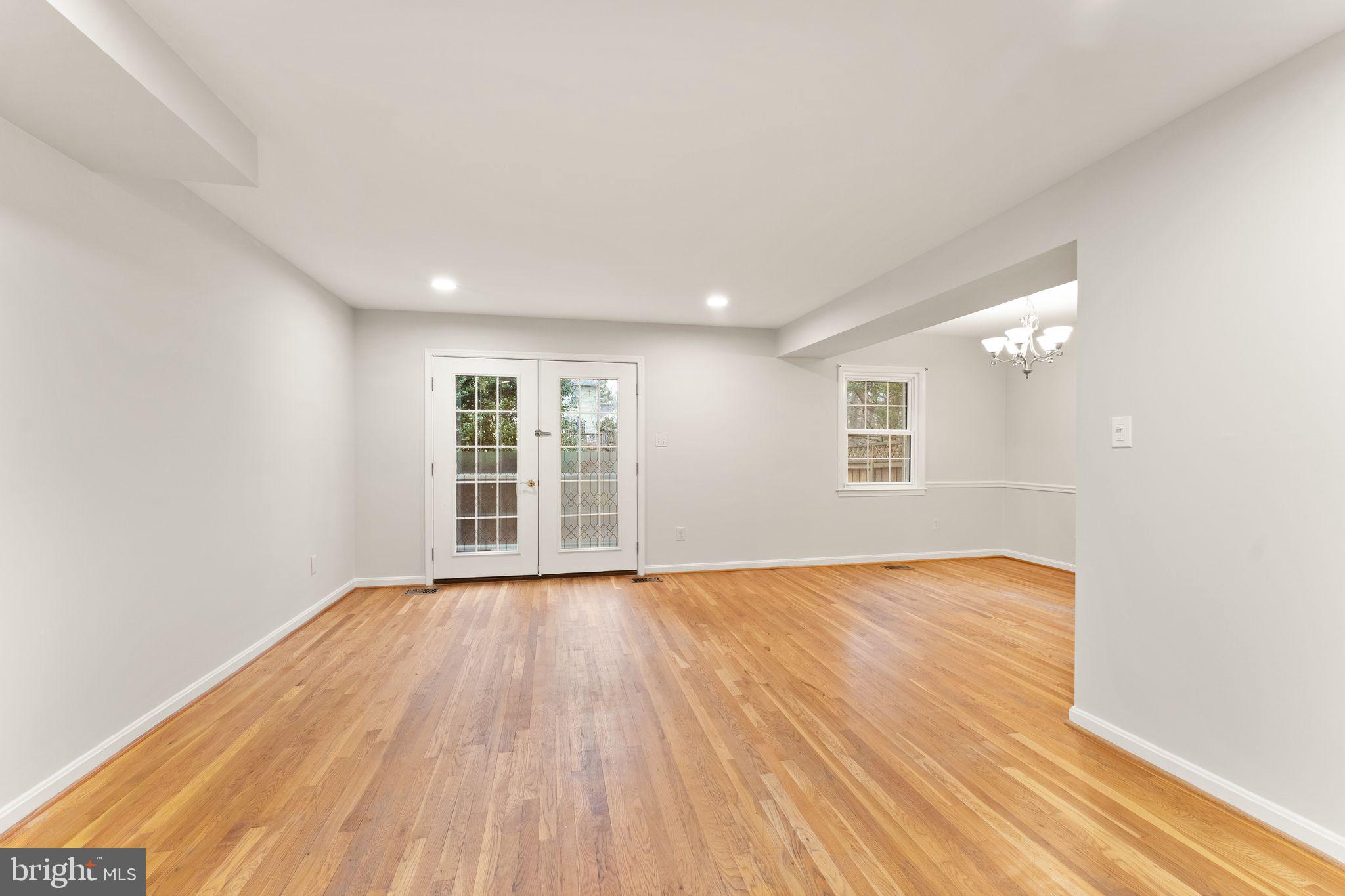 9710 Cardinal Road Fairfax, VA 22030 - Photo 8 of 51 Living room with natural lighting