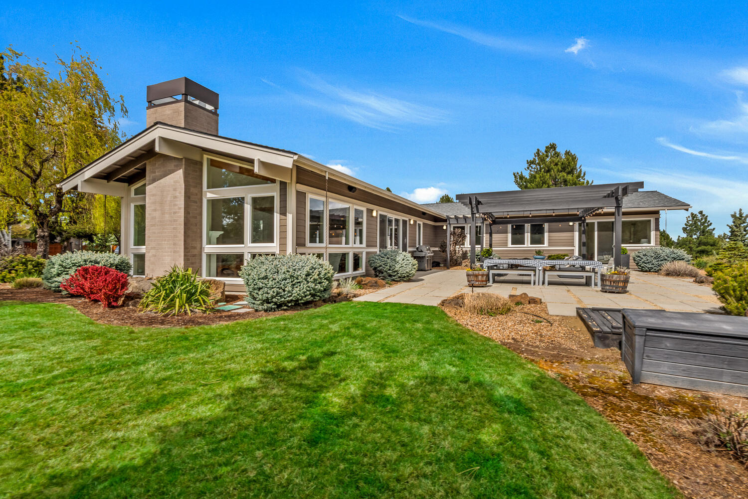 61510 Southwest Longview Street Bend, OR 97702 - Photo 1 of 43 a view of a house with swimming pool and porch