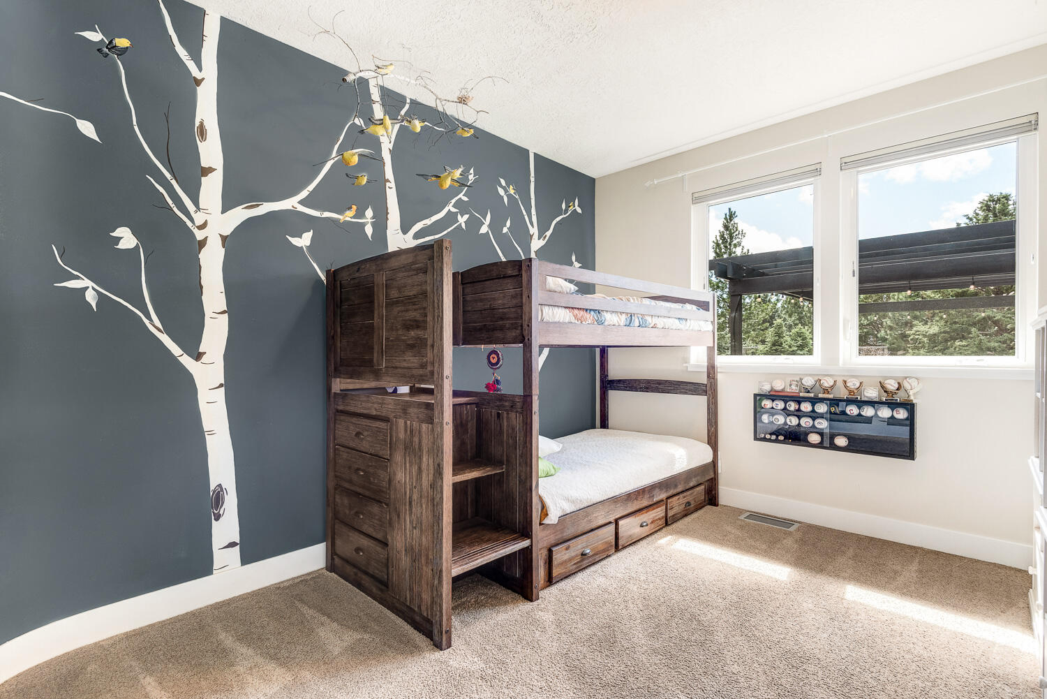 61510 Southwest Longview Street Bend, OR 97702 - Photo 28 of 43 a bedroom with furniture and window
