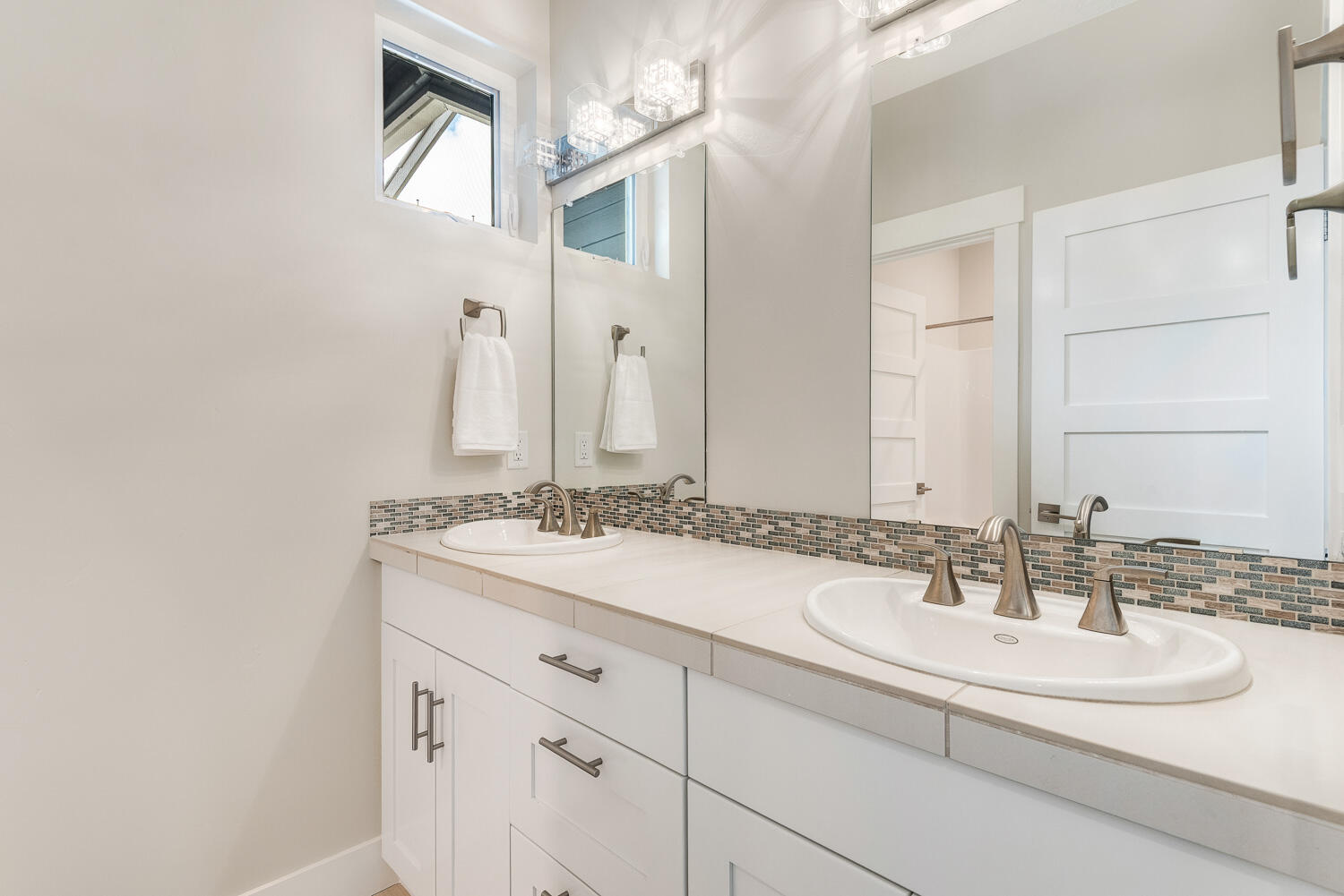 61510 Southwest Longview Street Bend, OR 97702 - Photo 30 of 43 a bathroom with a sink and a mirror