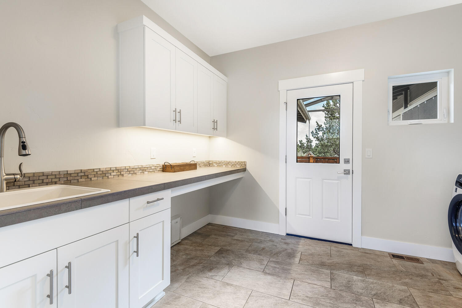 61510 Southwest Longview Street Bend, OR 97702 - Photo 32 of 43 a kitchen with a sink and cabinets