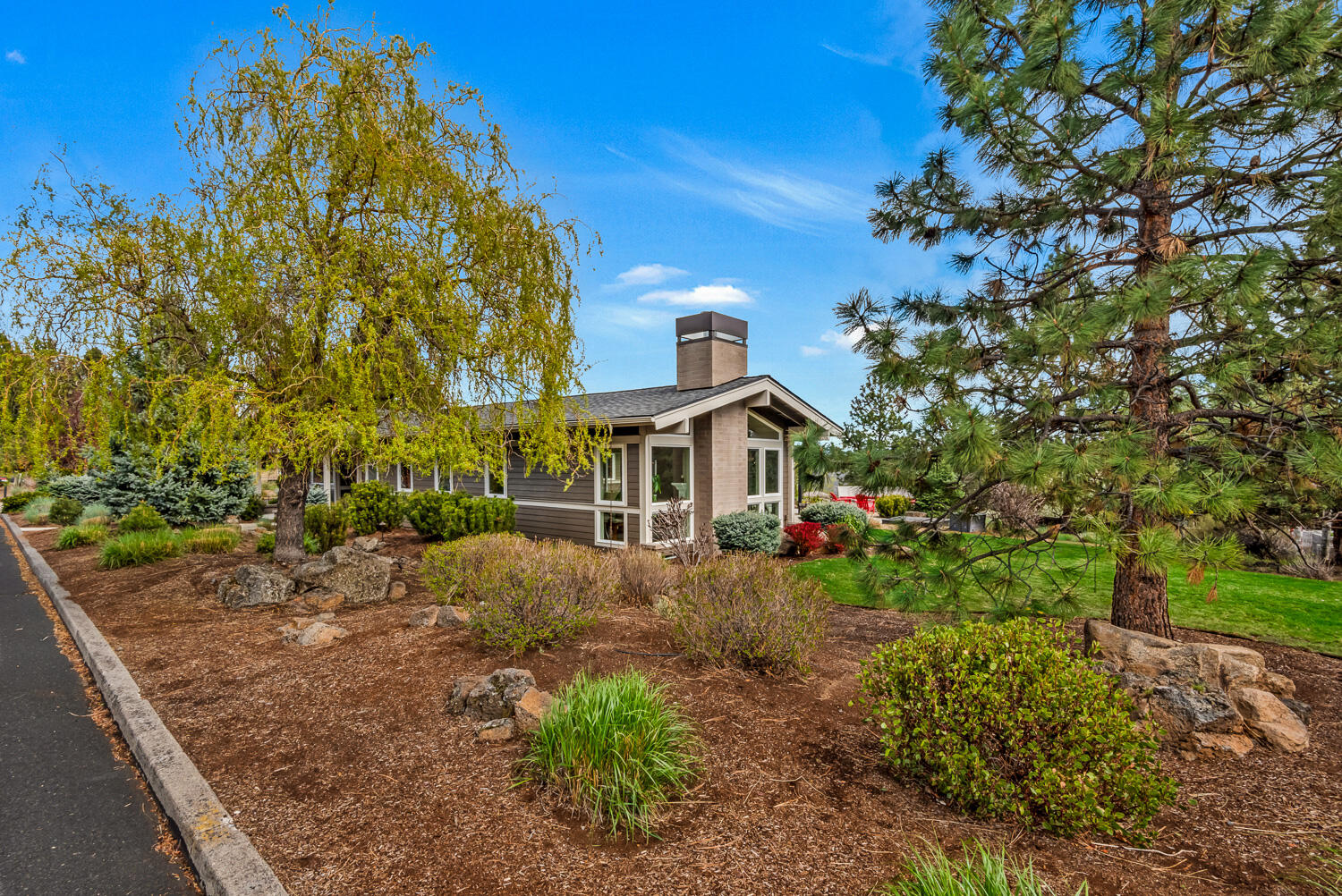 61510 Southwest Longview Street Bend, OR 97702 - Photo 43 of 43 a front view of a house with a yard