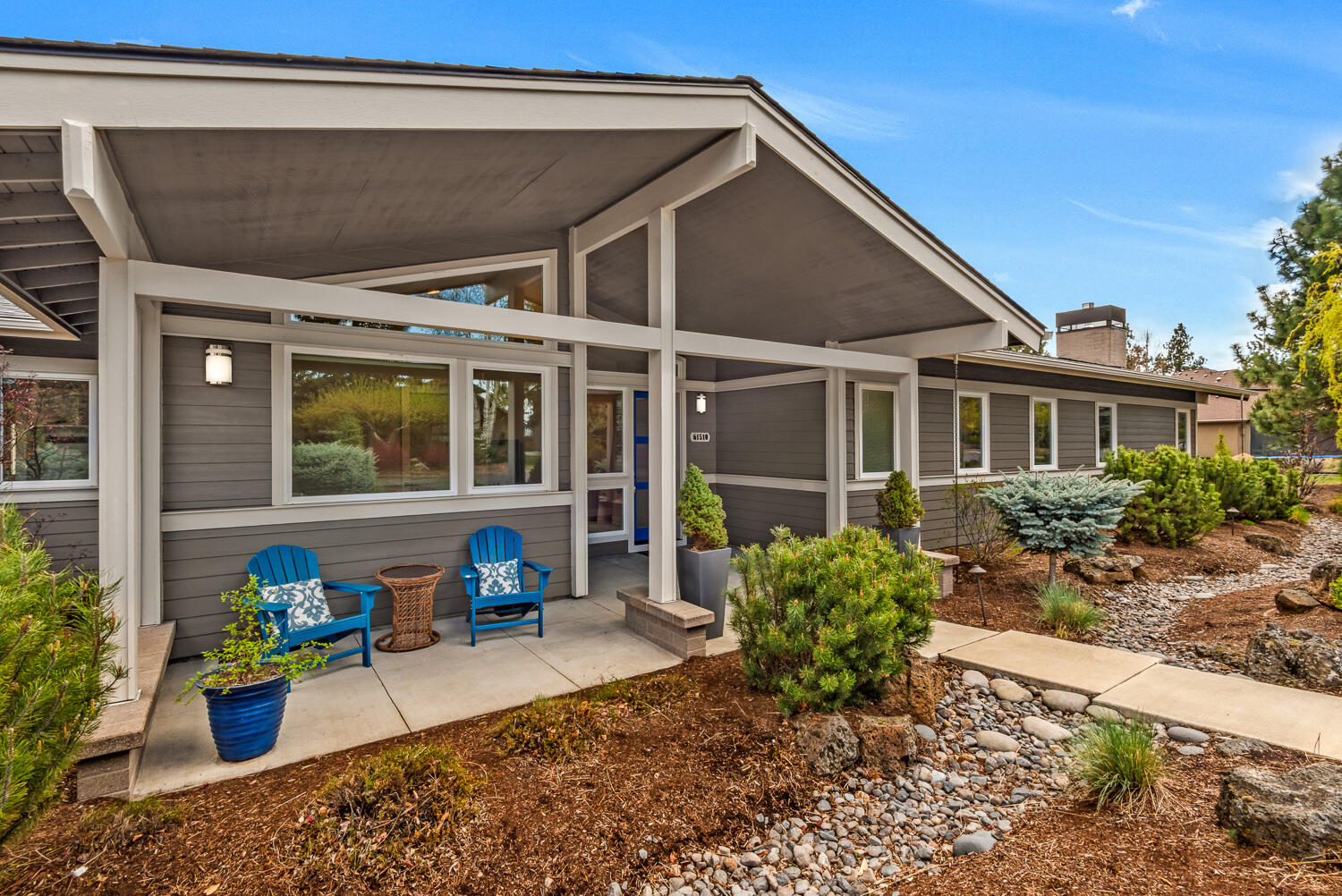 61510 Southwest Longview Street Bend, OR 97702 - Photo 6 of 43 a house view with a seating space