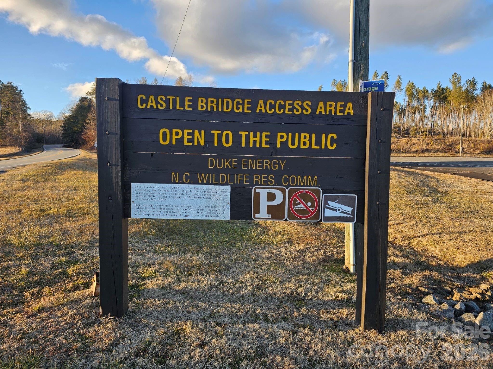 2167 Inlt Shr Road Northeast Connelly Springs, NC 28612 - Photo 12 of 15 a sign on the side of the road