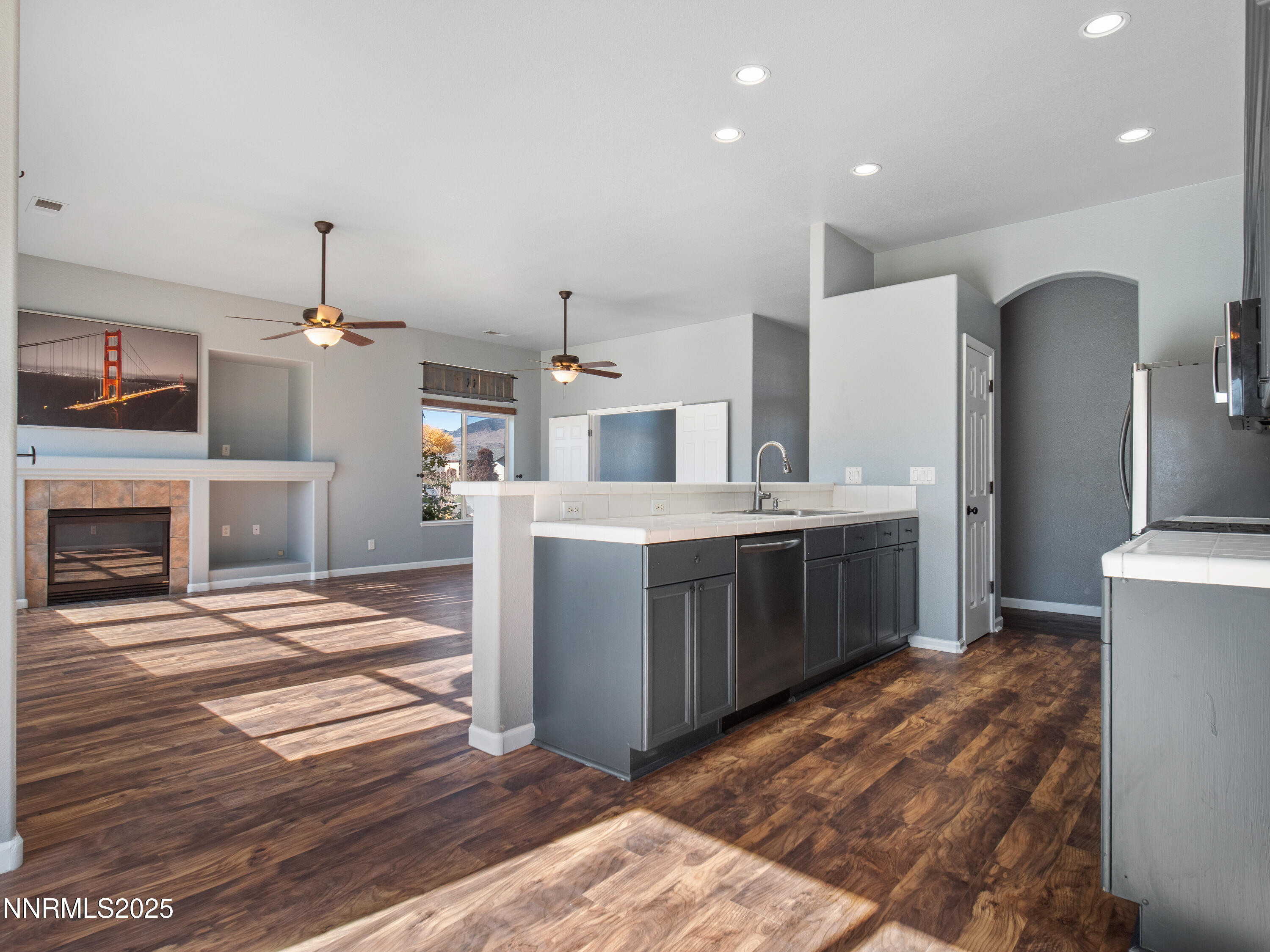 117 Elk Horn Drive Dayton, NV 89403 - Photo 11 of 59 a kitchen with a sink and a stove top oven