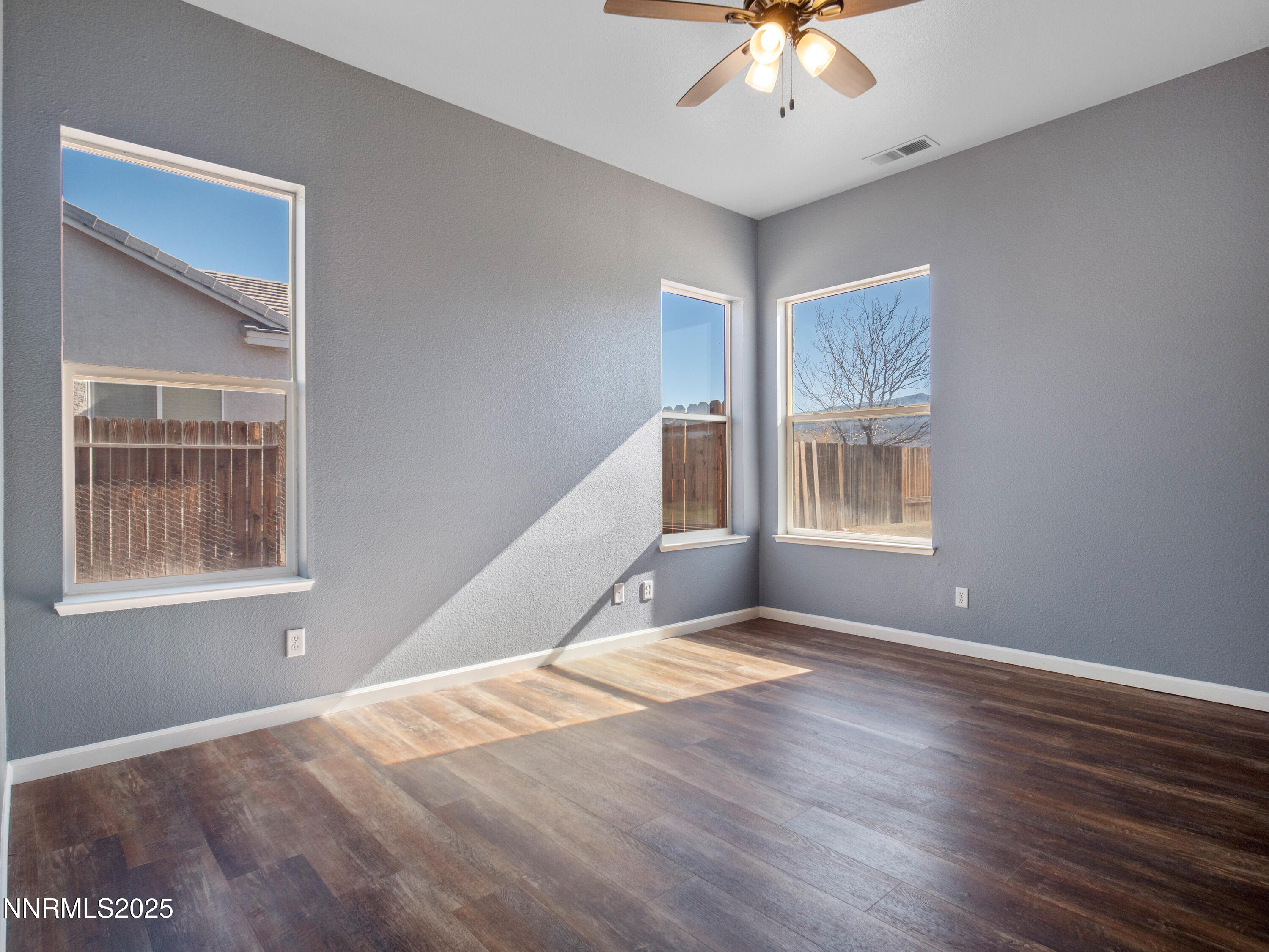 117 Elk Horn Drive Dayton, NV 89403 - Photo 21 of 59 a view of an empty room with a window