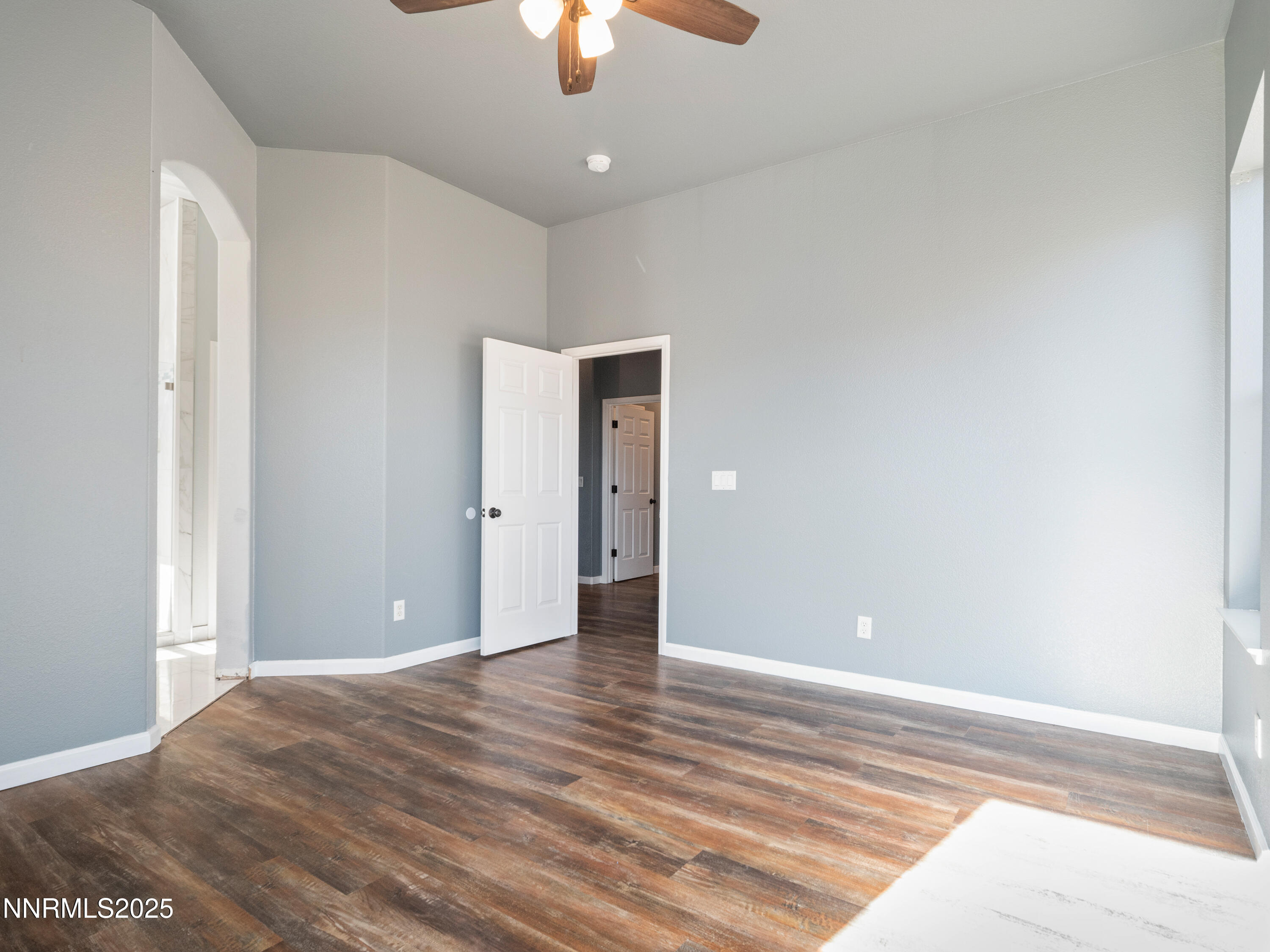 117 Elk Horn Drive Dayton, NV 89403 - Photo 23 of 59 a view of an empty room with a chandelier fan