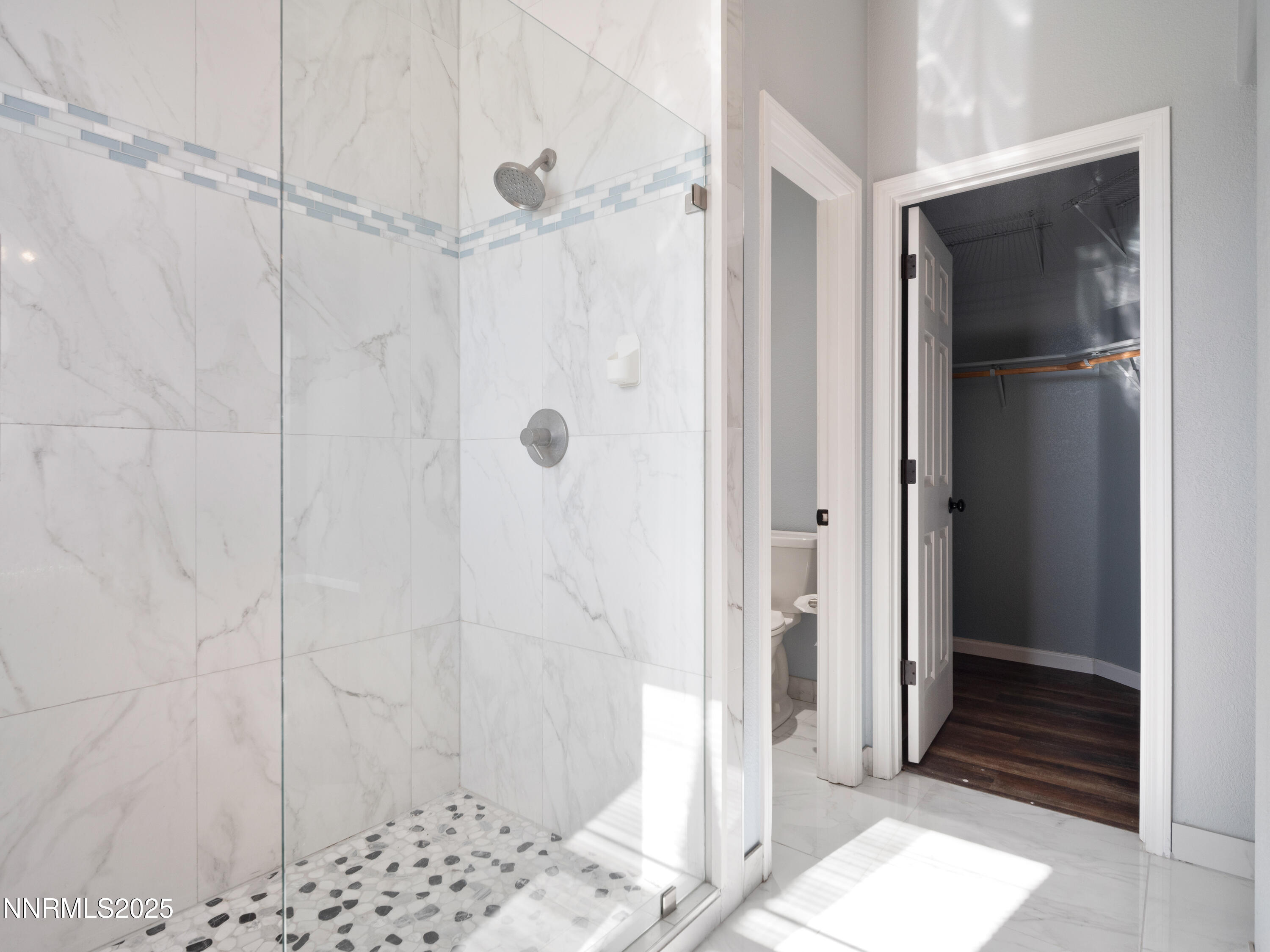 117 Elk Horn Drive Dayton, NV 89403 - Photo 25 of 59 a bathroom with a shower and a sink