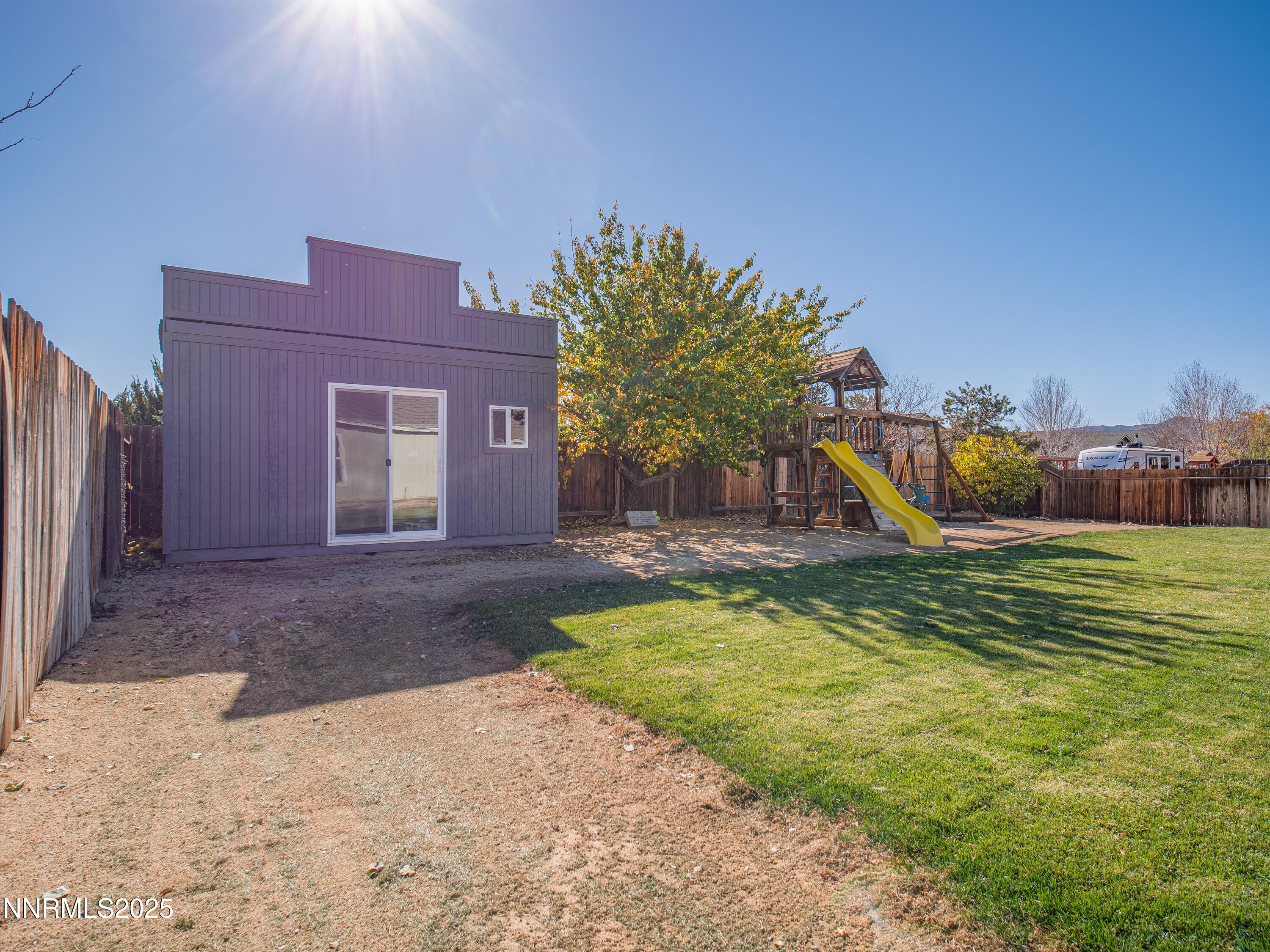 117 Elk Horn Drive Dayton, NV 89403 - Photo 35 of 59 a view of a house with a swimming pool and a yard