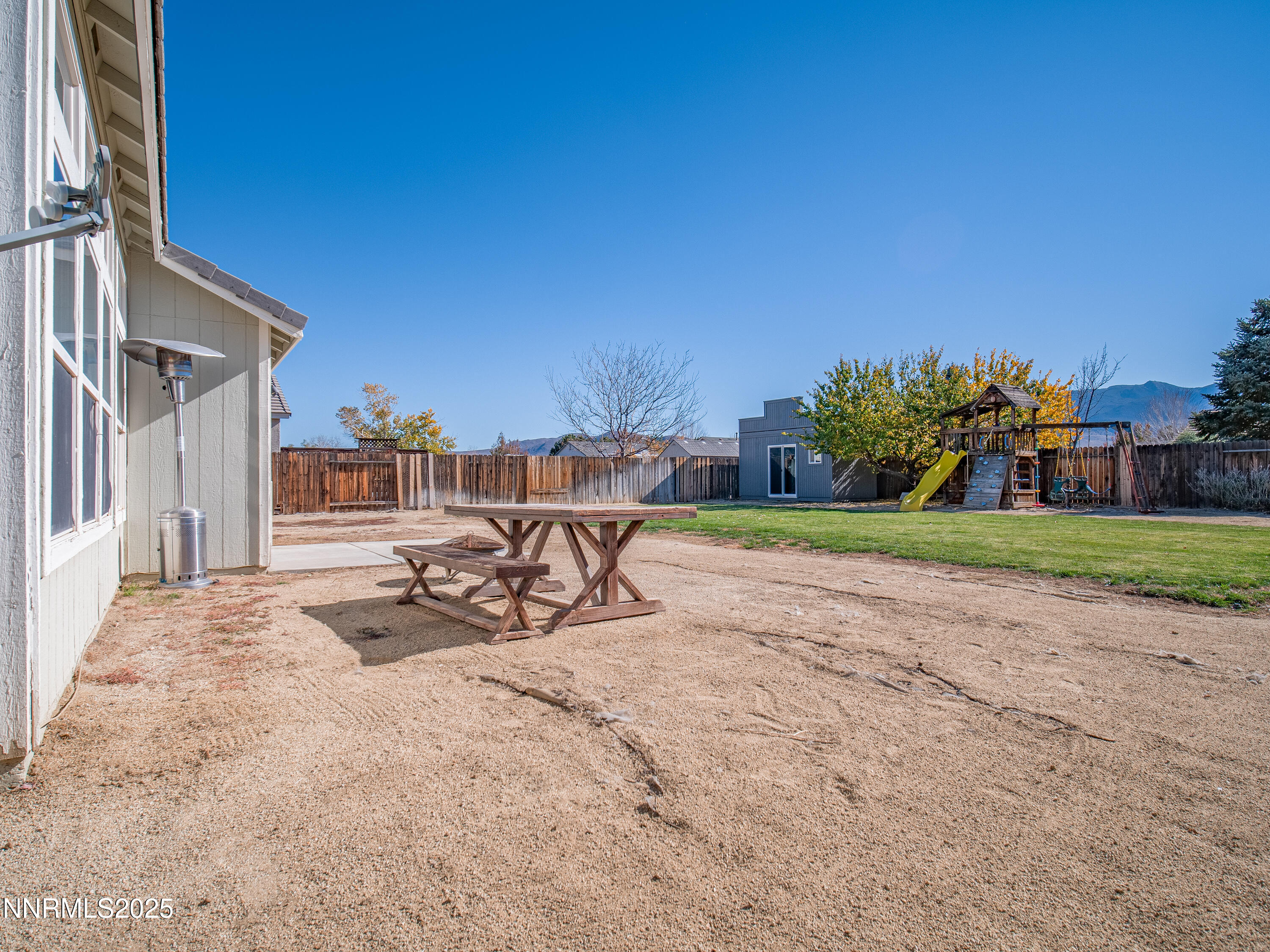 117 Elk Horn Drive Dayton, NV 89403 - Photo 38 of 59 a view of a backyard with a sitting area