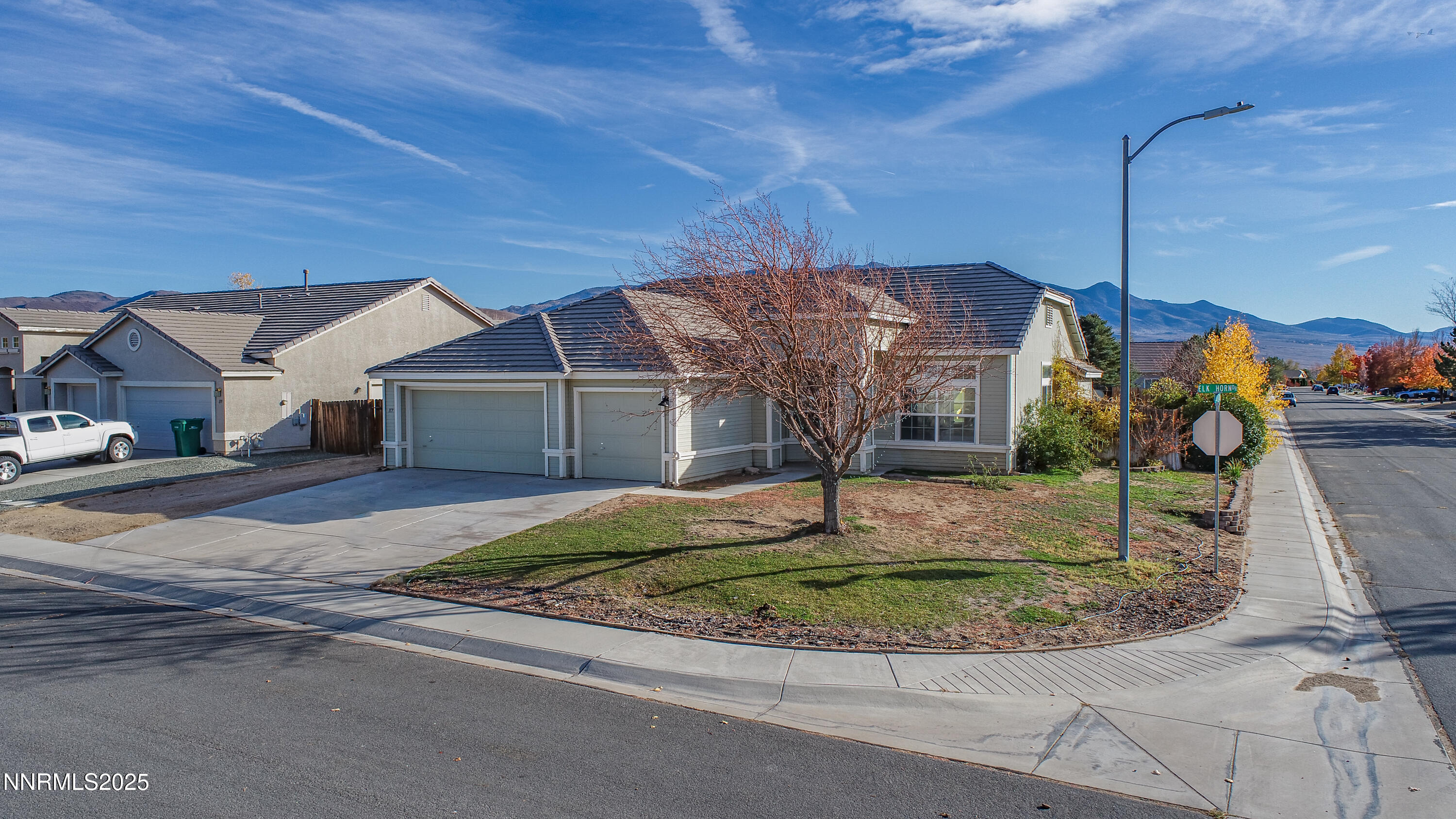 117 Elk Horn Drive Dayton, NV 89403 - Photo 49 of 59 a front view of a house with a yard