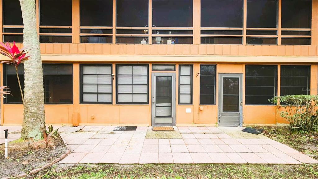 3200 River Ranch Boulevard, Unit 160 River Ranch, FL 33867 - Photo 16 of 20 a view of a brick house with an outdoor space