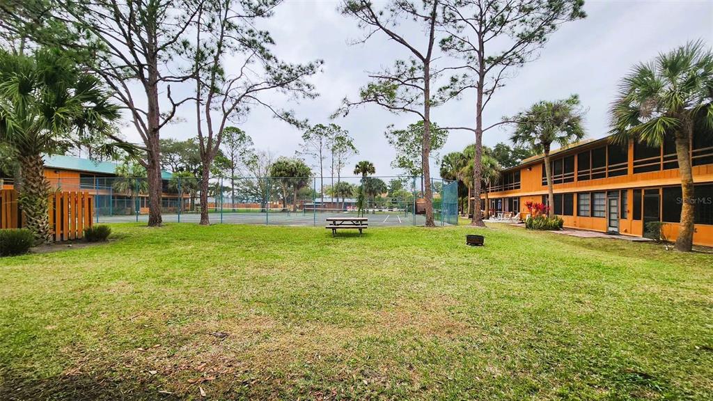 3200 River Ranch Boulevard, Unit 160 River Ranch, FL 33867 - Photo 19 of 20 a view of a house with a big yard