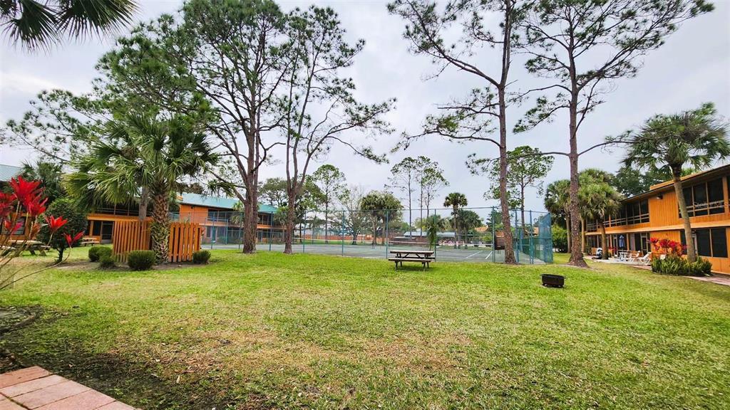 3200 River Ranch Boulevard, Unit 160 River Ranch, FL 33867 - Photo 20 of 20 a view of a house with a yard and sitting area