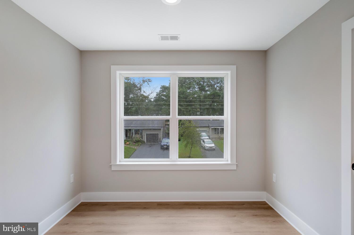 264 Schooner Road Manahawkin, NJ 08050 - Photo 17 of 37 an empty room with a window