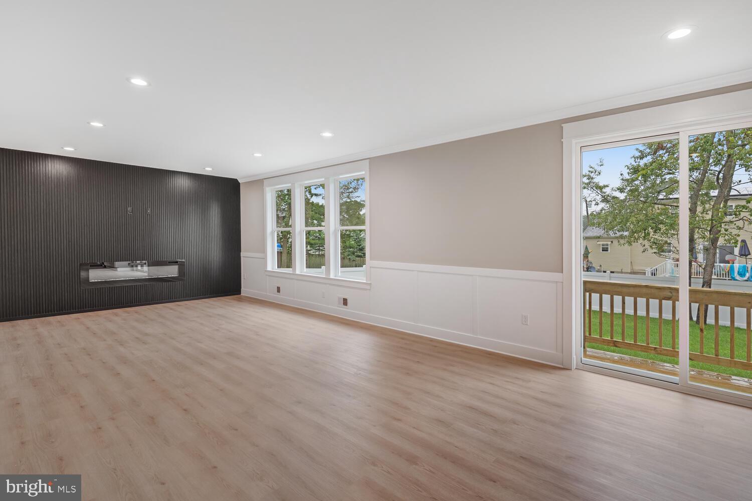 264 Schooner Road Manahawkin, NJ 08050 - Photo 3 of 37 a view of an empty room with a window