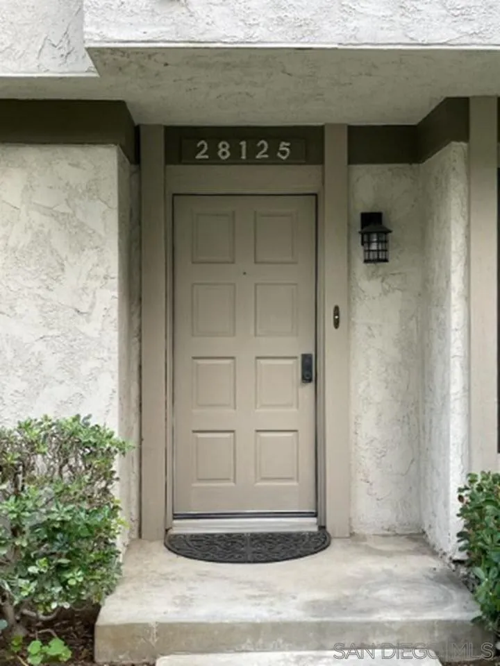 a view of entrance gate of the house
