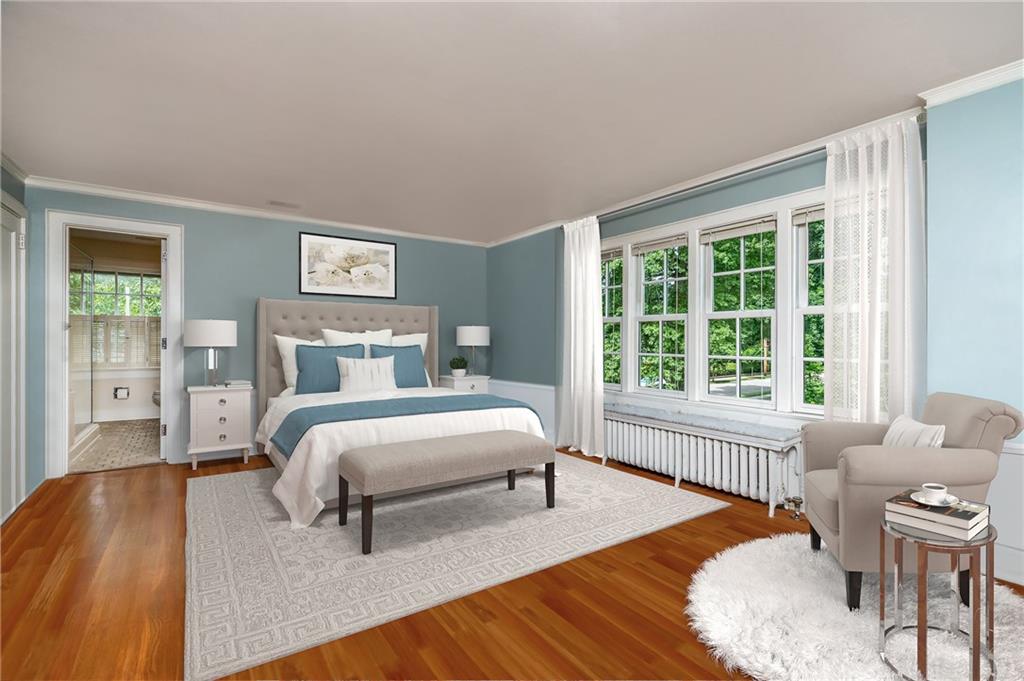 604 Pine Road Sewickley, PA 15143 - Photo 14 of 24 a bedroom with a bed and a large window