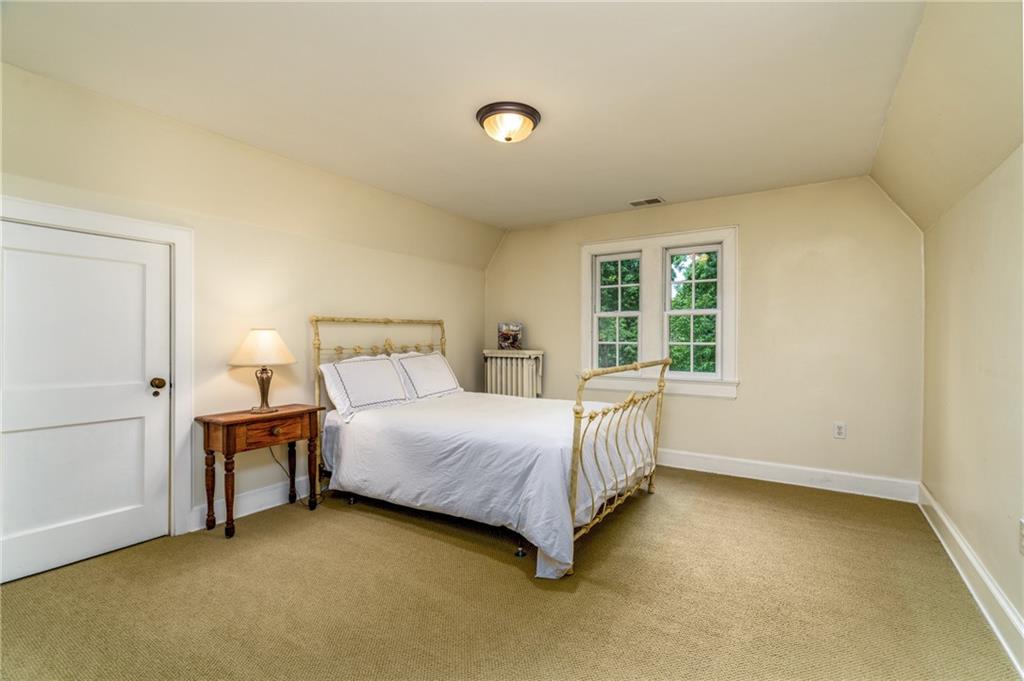 604 Pine Road Sewickley, PA 15143 - Photo 19 of 24 a bed room with a bed and a window