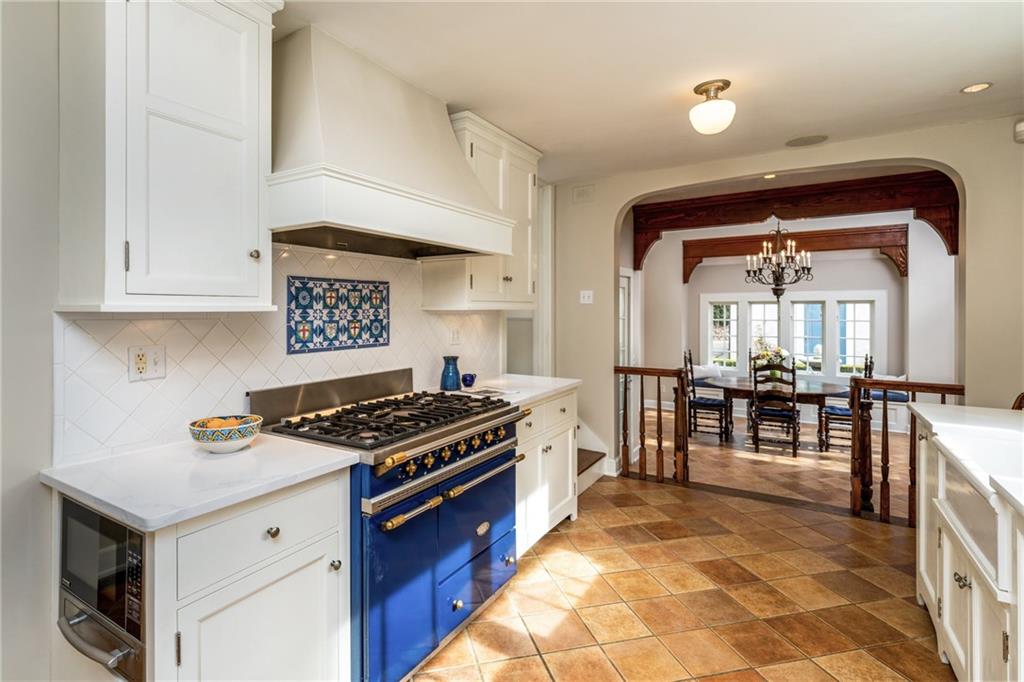 604 Pine Road Sewickley, PA 15143 - Photo 3 of 24 a kitchen with stainless steel appliances granite countertop a stove and a sink