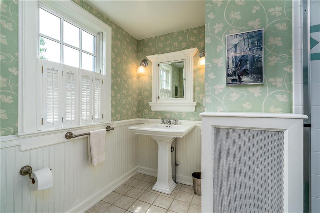 604 Pine Road Sewickley, PA 15143 - Photo 21 of 24 a bathroom with a sink a toilet and mirror