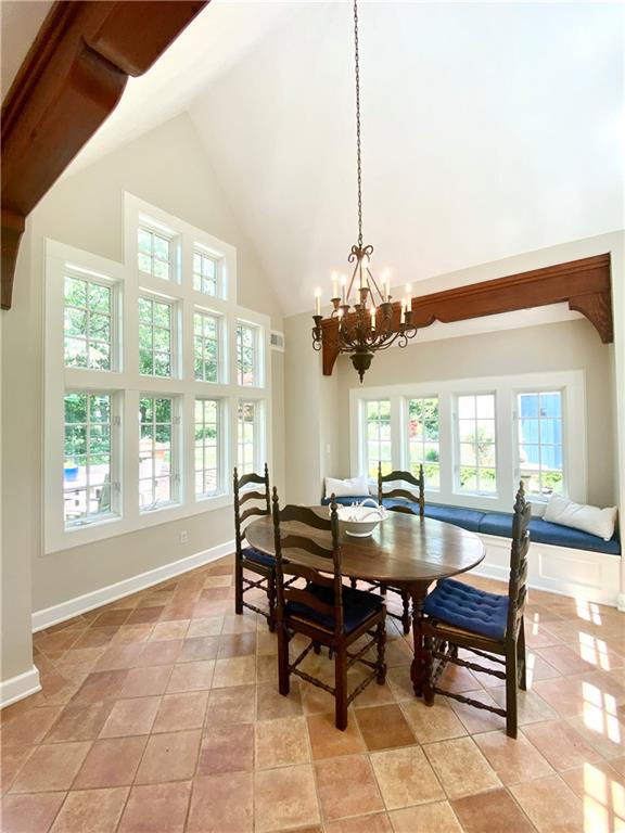 604 Pine Road Sewickley, PA 15143 - Photo 4 of 24 a dining room with furniture a chandelier and wooden floor